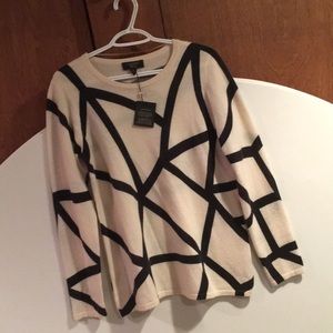 Black and cream sweater